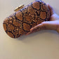 SNAKE PRINT CAPSULE PURSE